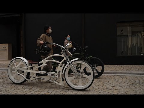 Riding the Raptor Pro DS 800W Stretched Cruiser Ebike on the road.